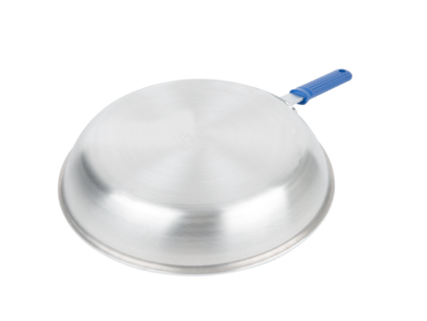 Fry pan with blue handle face down.