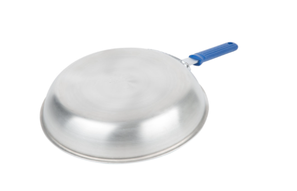 Fry pan with blue handle face down.