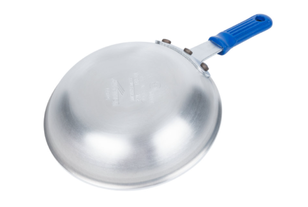 Fry pan with blue handle face down.