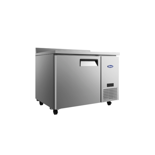 Side view stainless steel 27" worktop freezer with backsplash.